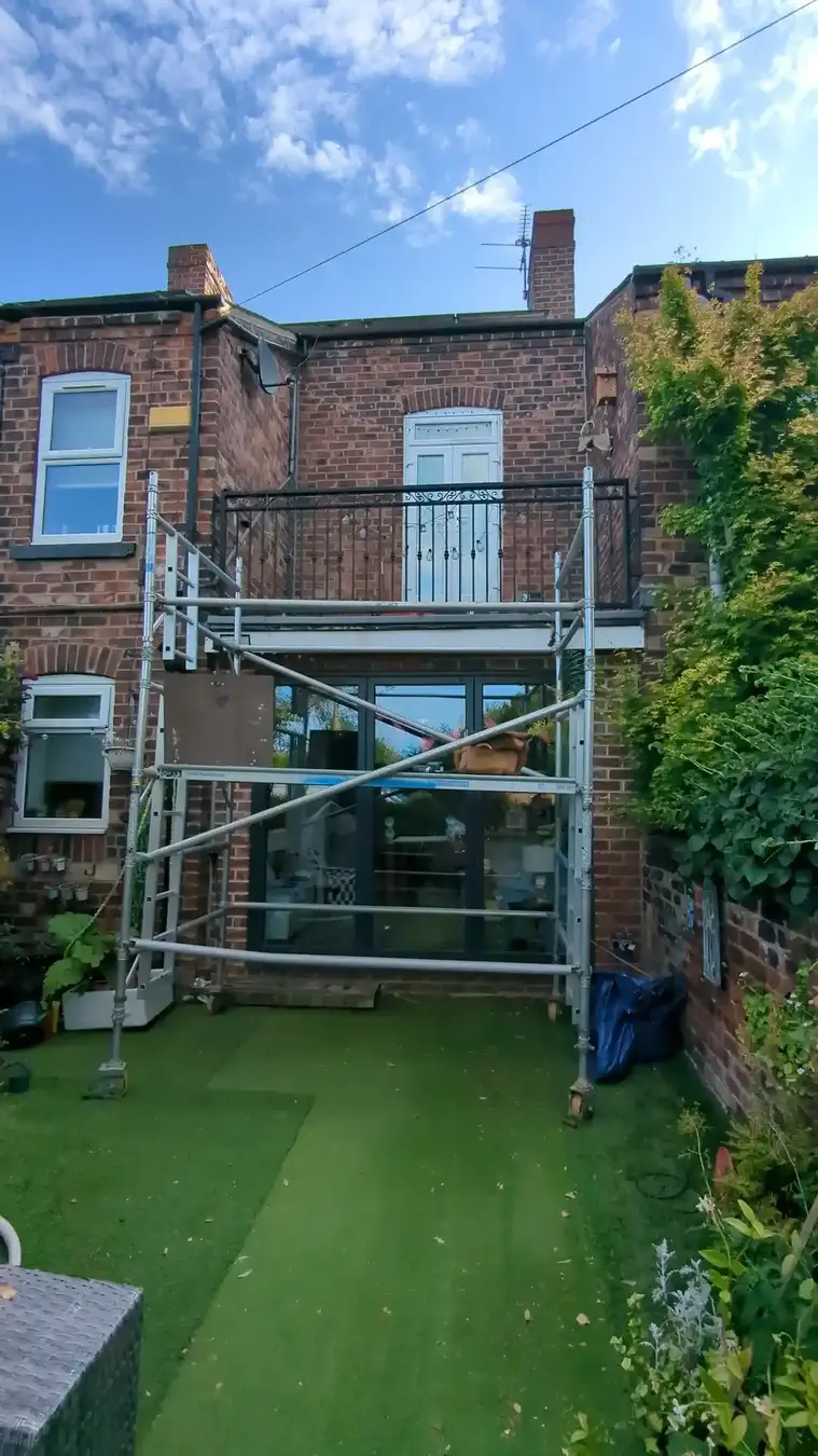 Flat roof repair in Wakefield before the damaged roof was stripped
