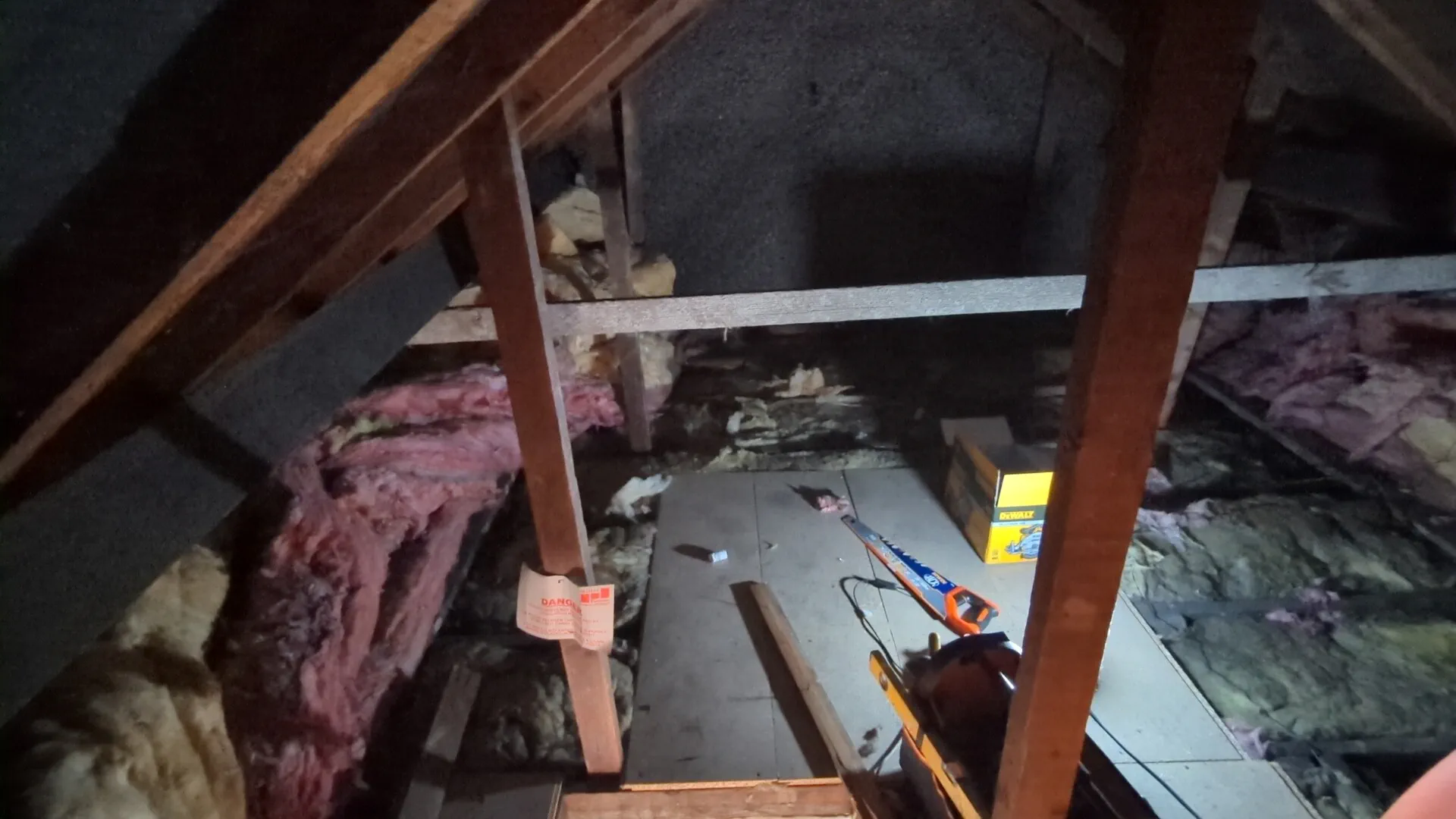 Loft in South Kirkby before boarding, with insulation between the existing ceiling joists