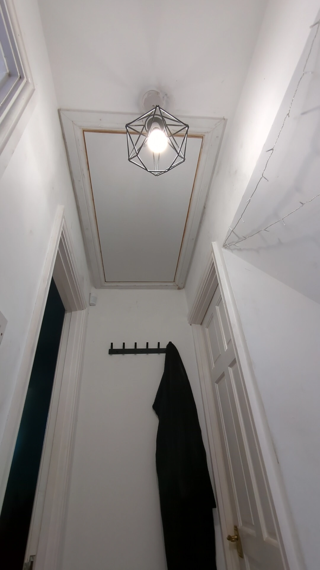 Loft hatch trimmed with architrave and finished from below