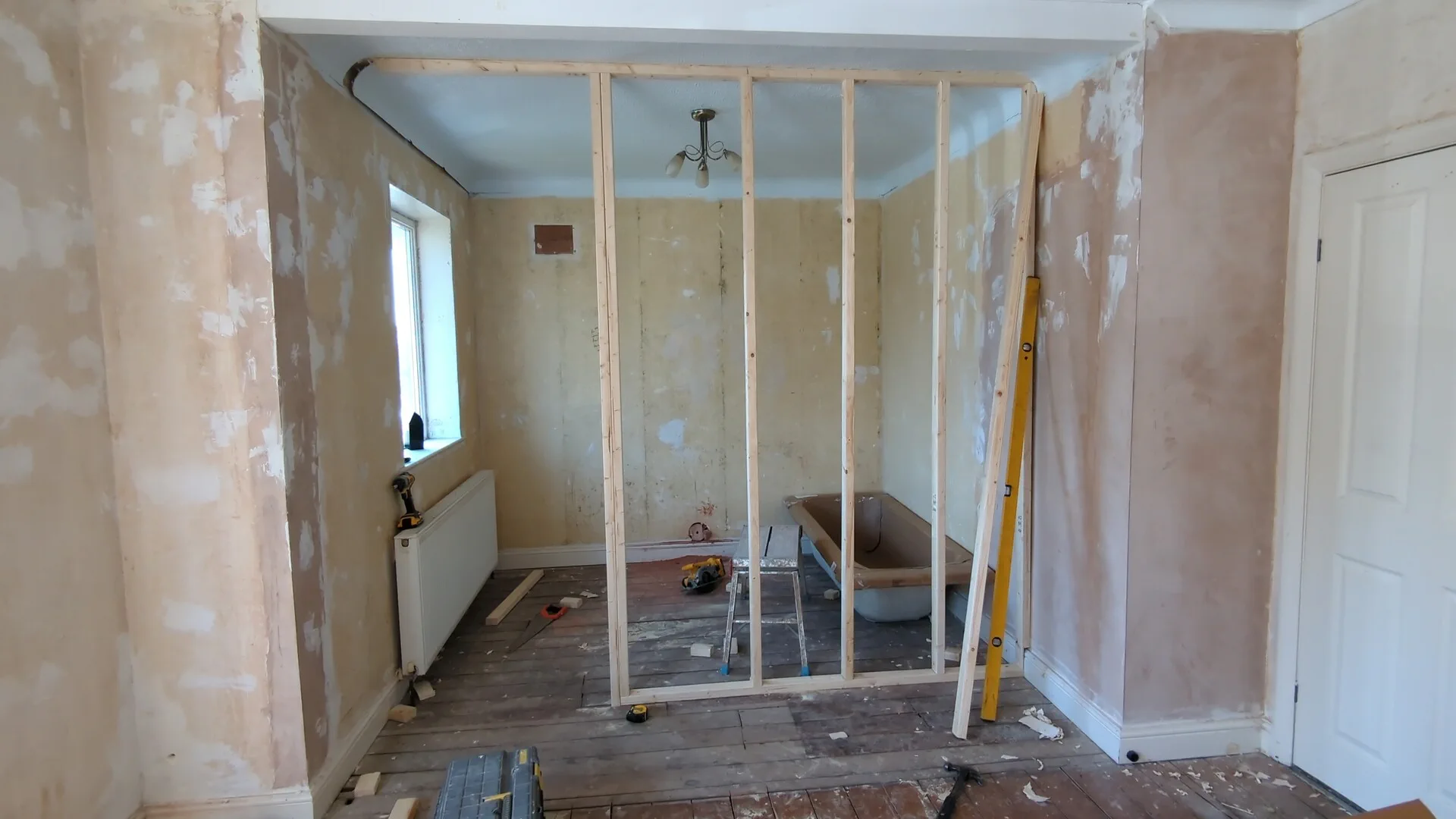 Door opening framed in the stud partition wall with doubled studs