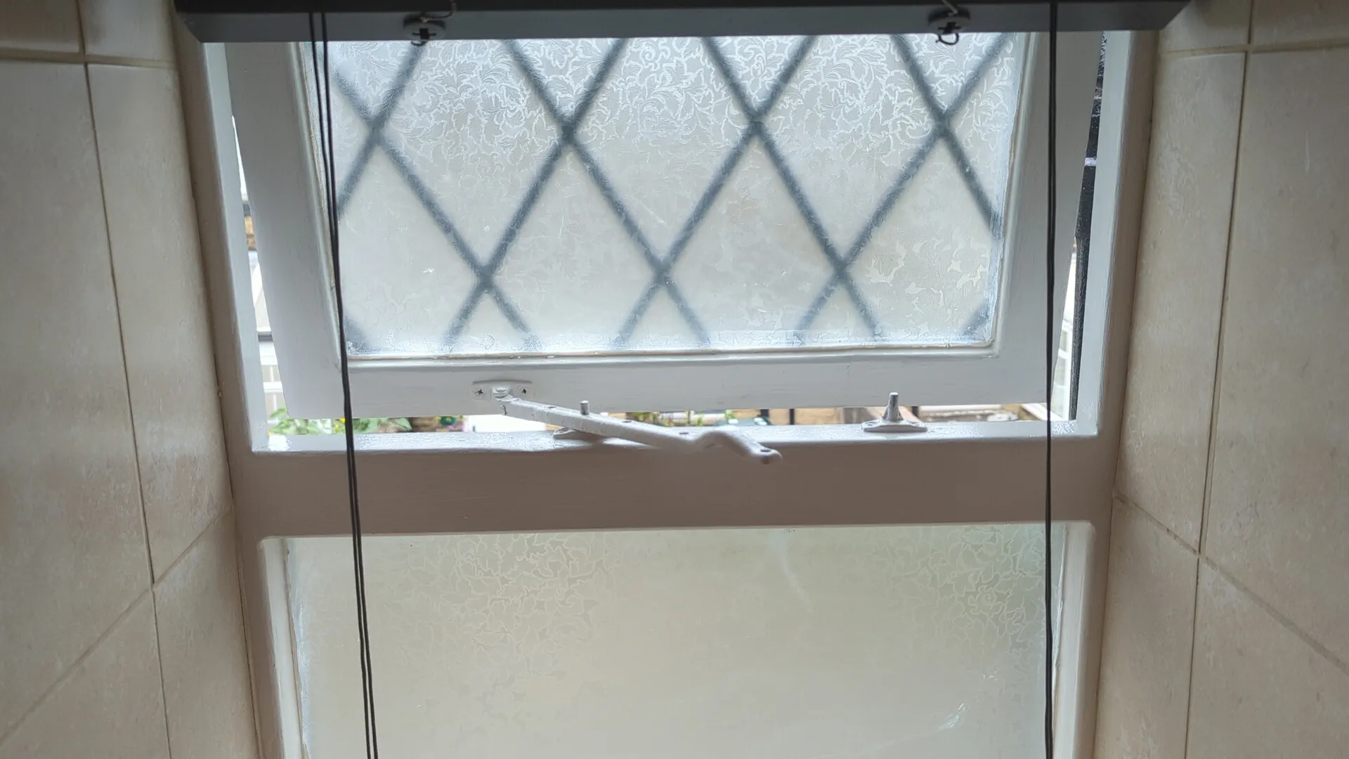 Repaired casement window back in use in a Grade II listed cottage in Greengates, Bradford