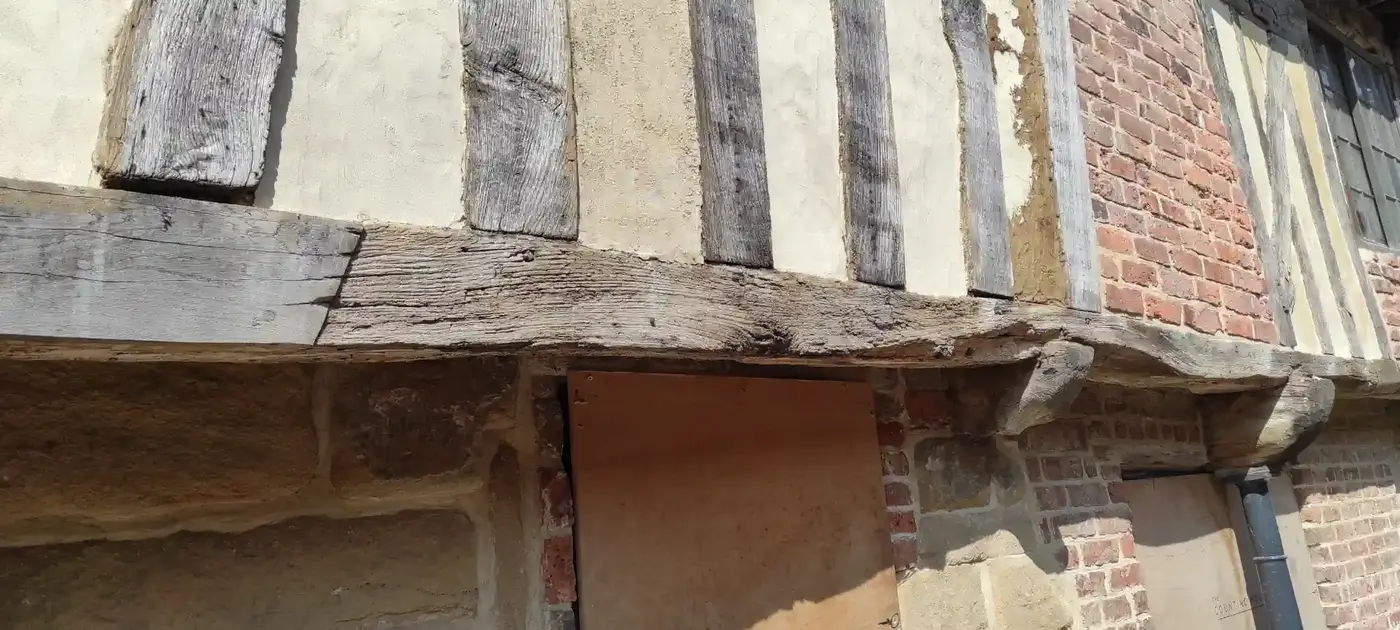 The timber-framed exterior of The Counting House in Pontefract — weathered oak framing, lime plaster and old brickwork