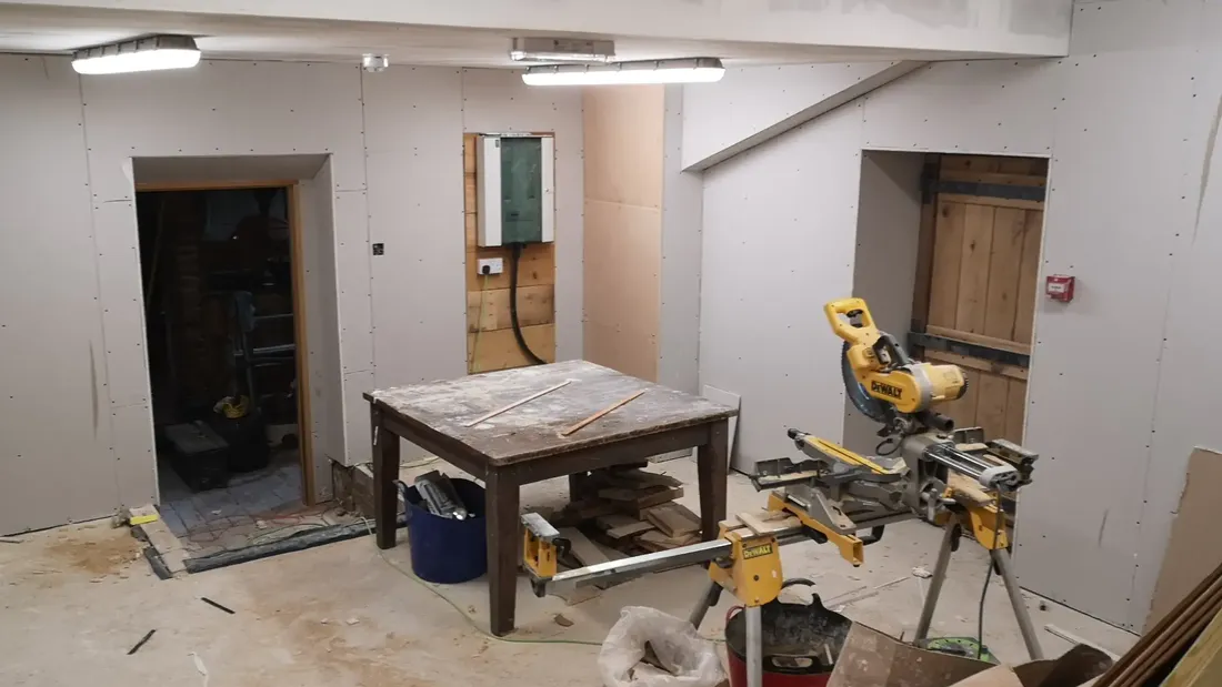 Kitchen area studwork plasterboarded and ready for fit-out at The Counting House