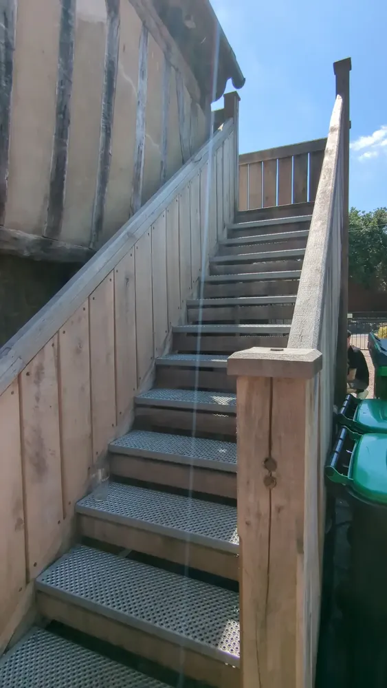 Solid oak staircase and landing with non-slip treads at The Counting House