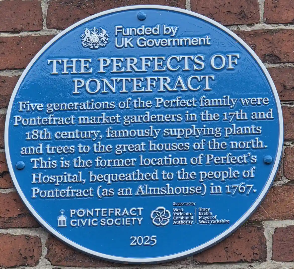 Pontefract Civic Society blue plaque marking the former Perfect’s Hospital at 18-22 Micklegate
