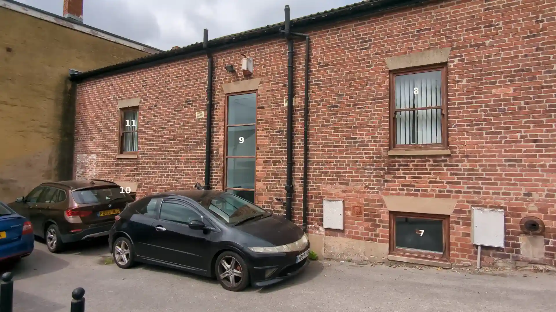 Rear elevation timber windows numbered seven to eleven for the repair schedule in Pontefract