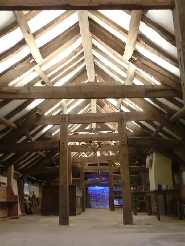 Oak roof frame with trusses and exposed rafters